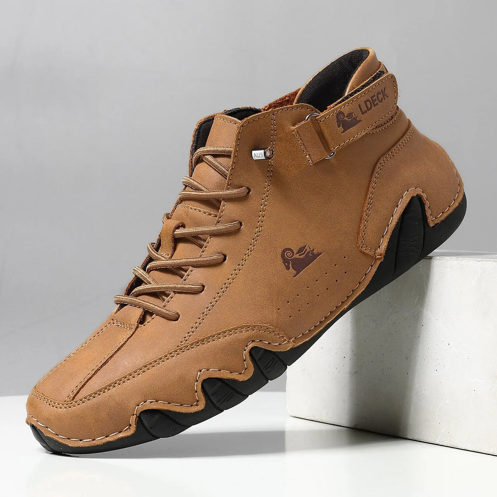 Men's khaki high top octopus boots with a rubber sole and textured microfiber upper.