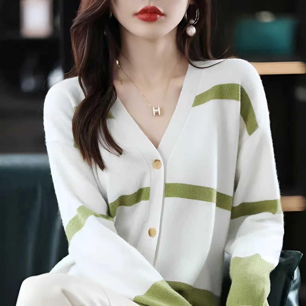 Women's striped V-neck cardigan with a raised 3D pattern, shown buttoned.