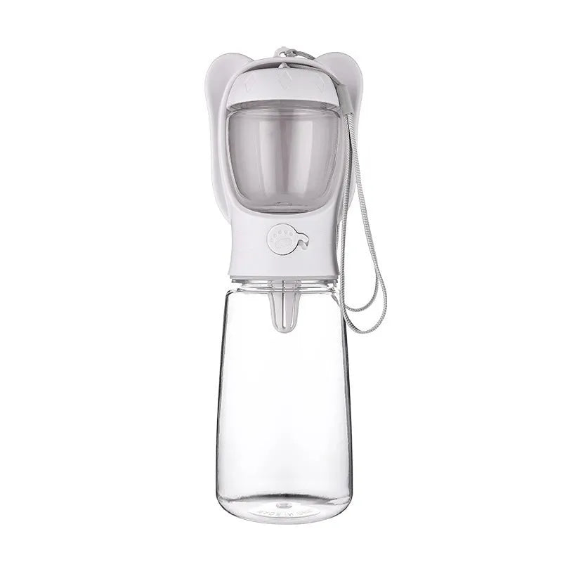 2-in-1 portable dog water bottle with food container, leak-proof, 350ml, green, on hiking trail