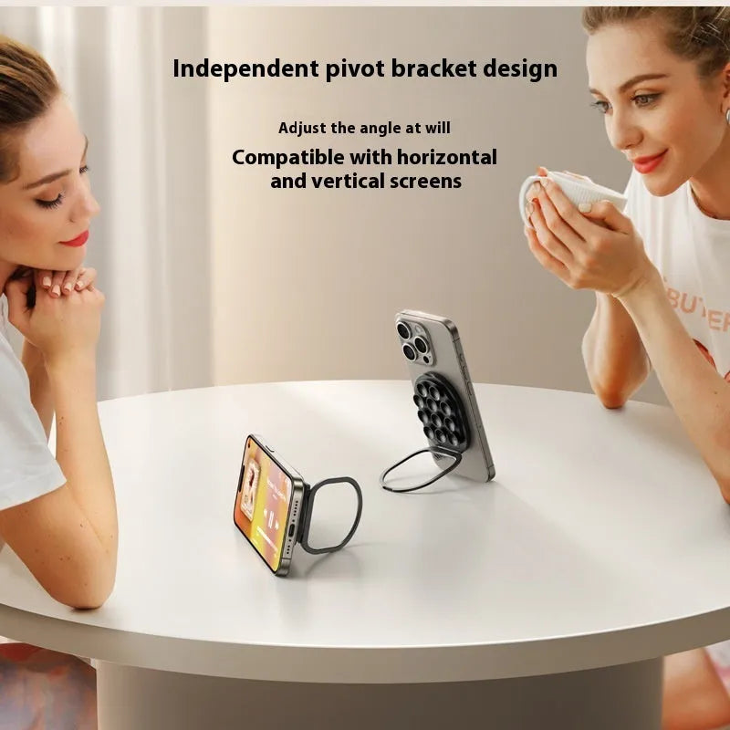 Silica gel sucker magnetic phone holder in black for car dashboard and windscreen mounting