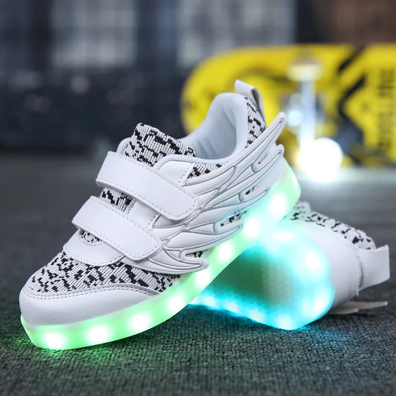 Plum red children's sneakers with colourful LED lights on the soles and sides.