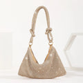 Rhinestone evening bag with full diamond finish, approximately 26x16cm, 13cm handle, polyester lining.