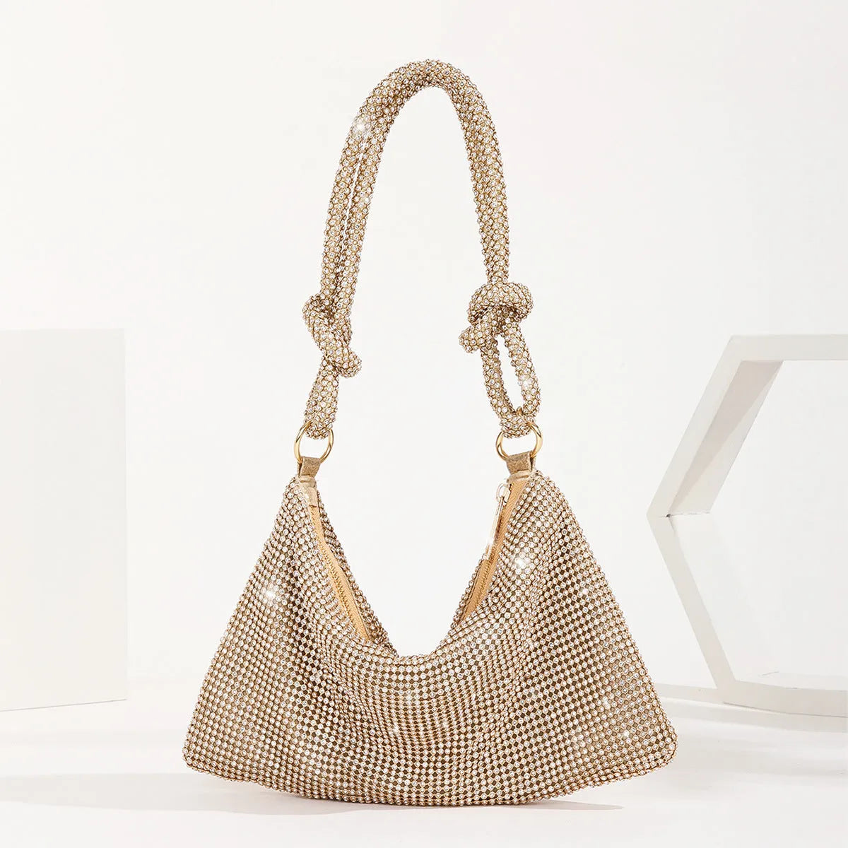 Rhinestone evening bag with full diamond finish, approximately 26x16cm, 13cm handle, polyester lining.