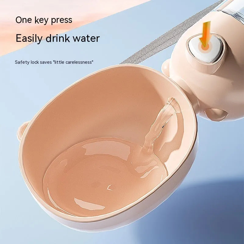 Portable plastic dog water bottle with attached feeding bowl in yellow colour.