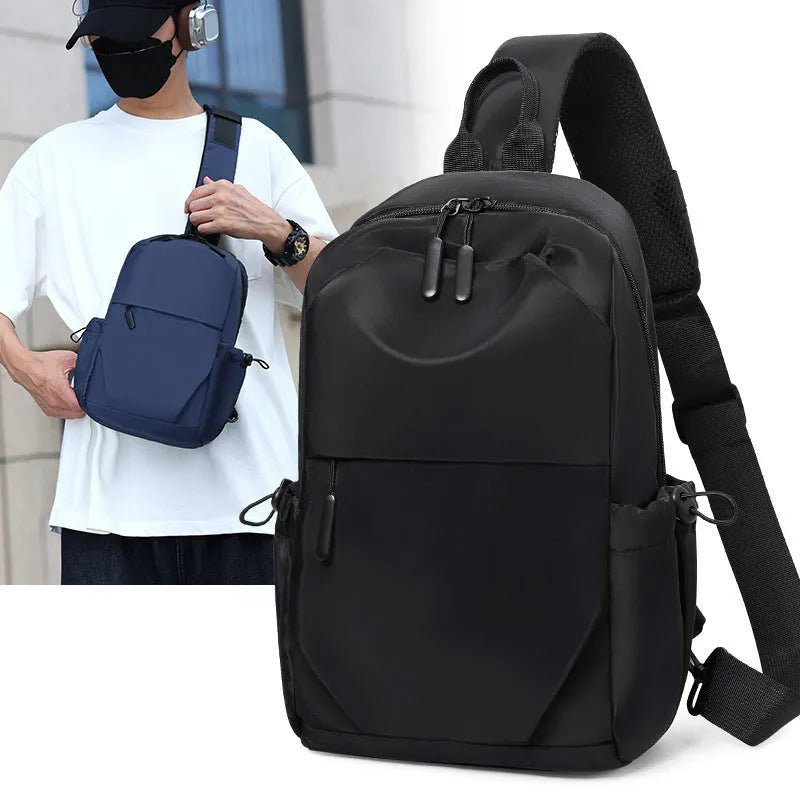 Grey waterproof polyester chest bag for men showing shoulder strap and main compartment