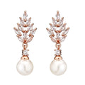Geometric flower earrings with micro inlaid zircon and pearl accents in gold, white gold, and rose gold plating options