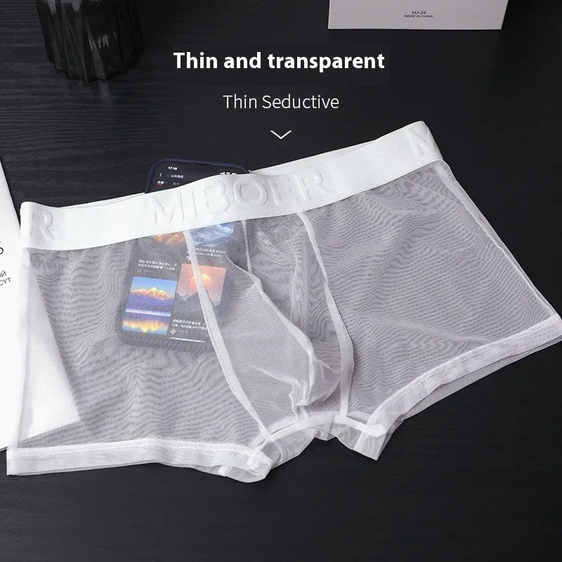 Men's solid colour thin boxer shorts in quick-dry polyester fabric on a size chart