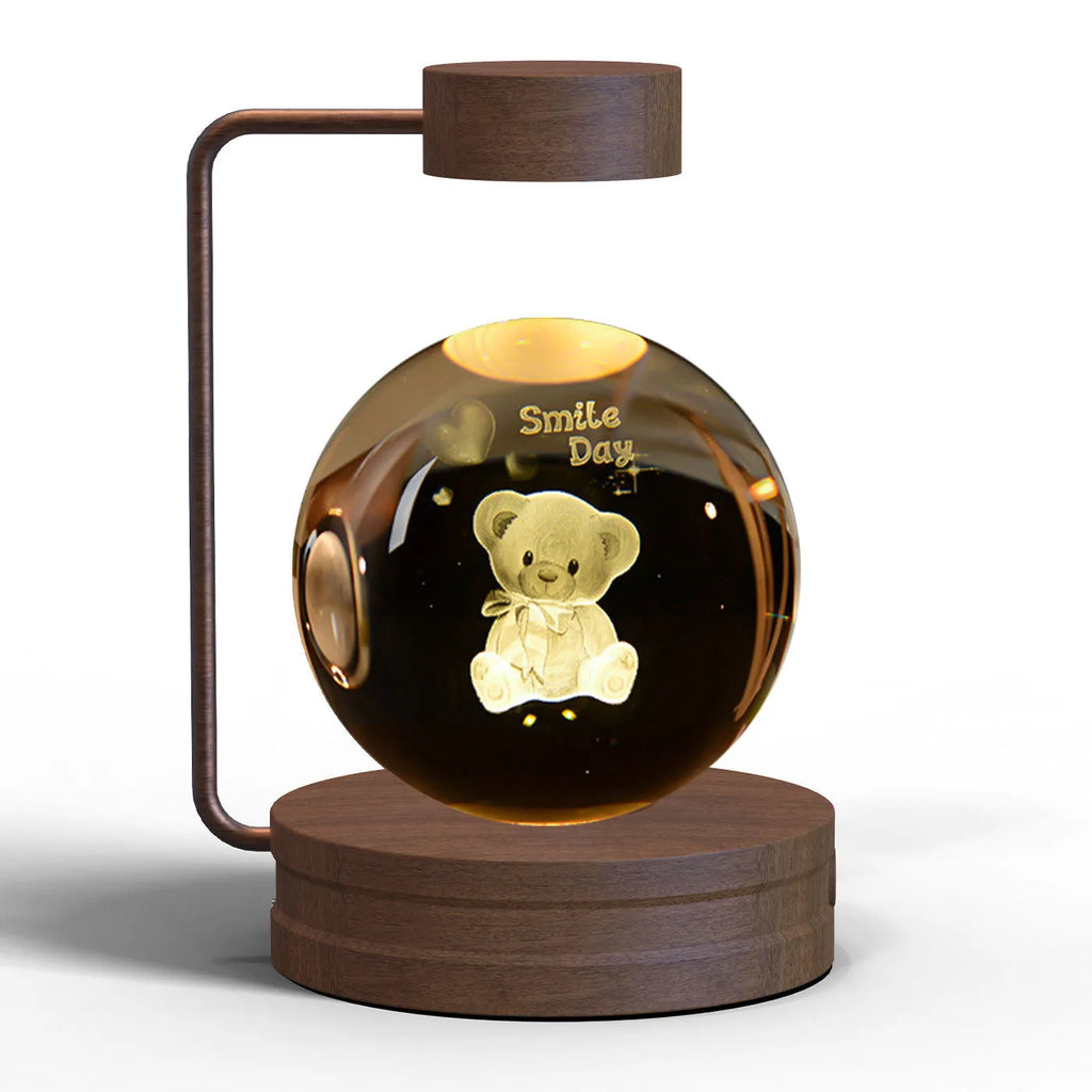 Crystal ball cosmic dinosaur indoor night light with 3D etched pattern, walnut base, and USB power cable