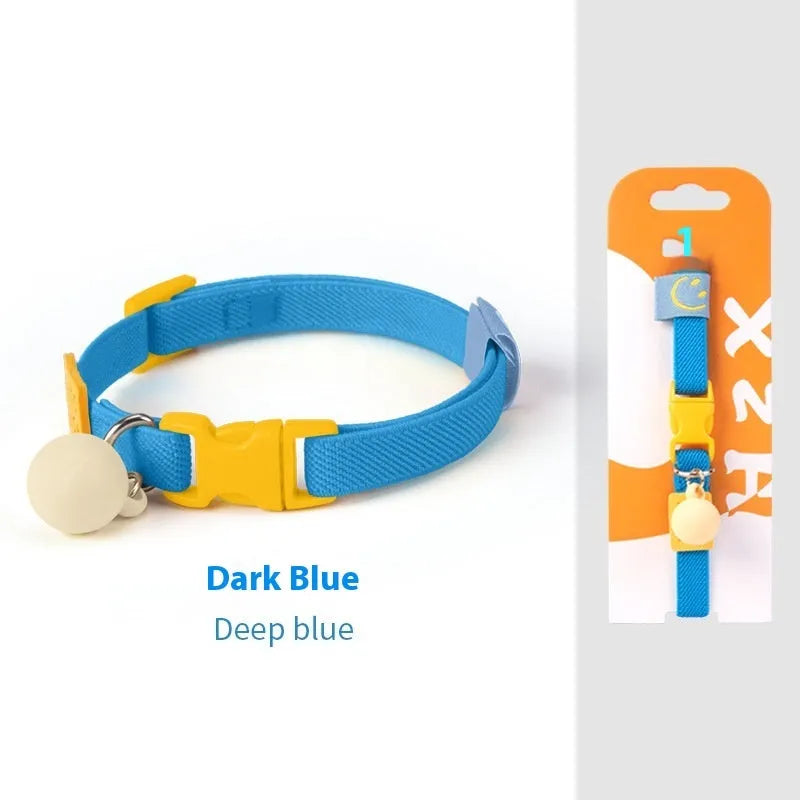 A stretchy, solid-colour polyester dog collar for small breeds, shown in sky blue, adjustable from 22 to 32 centimetres.
