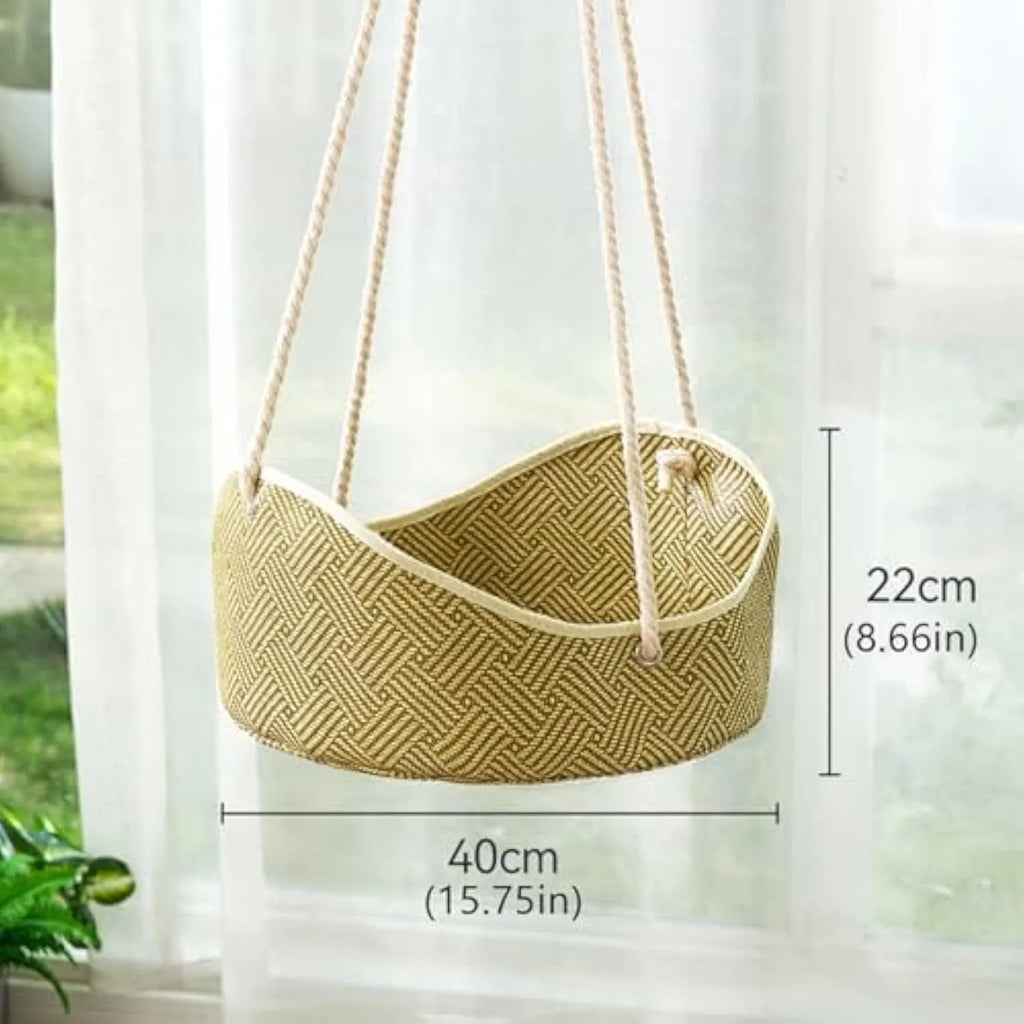 Green rattan cat cage hammock with metal hooks, shown hanging on a shelf.