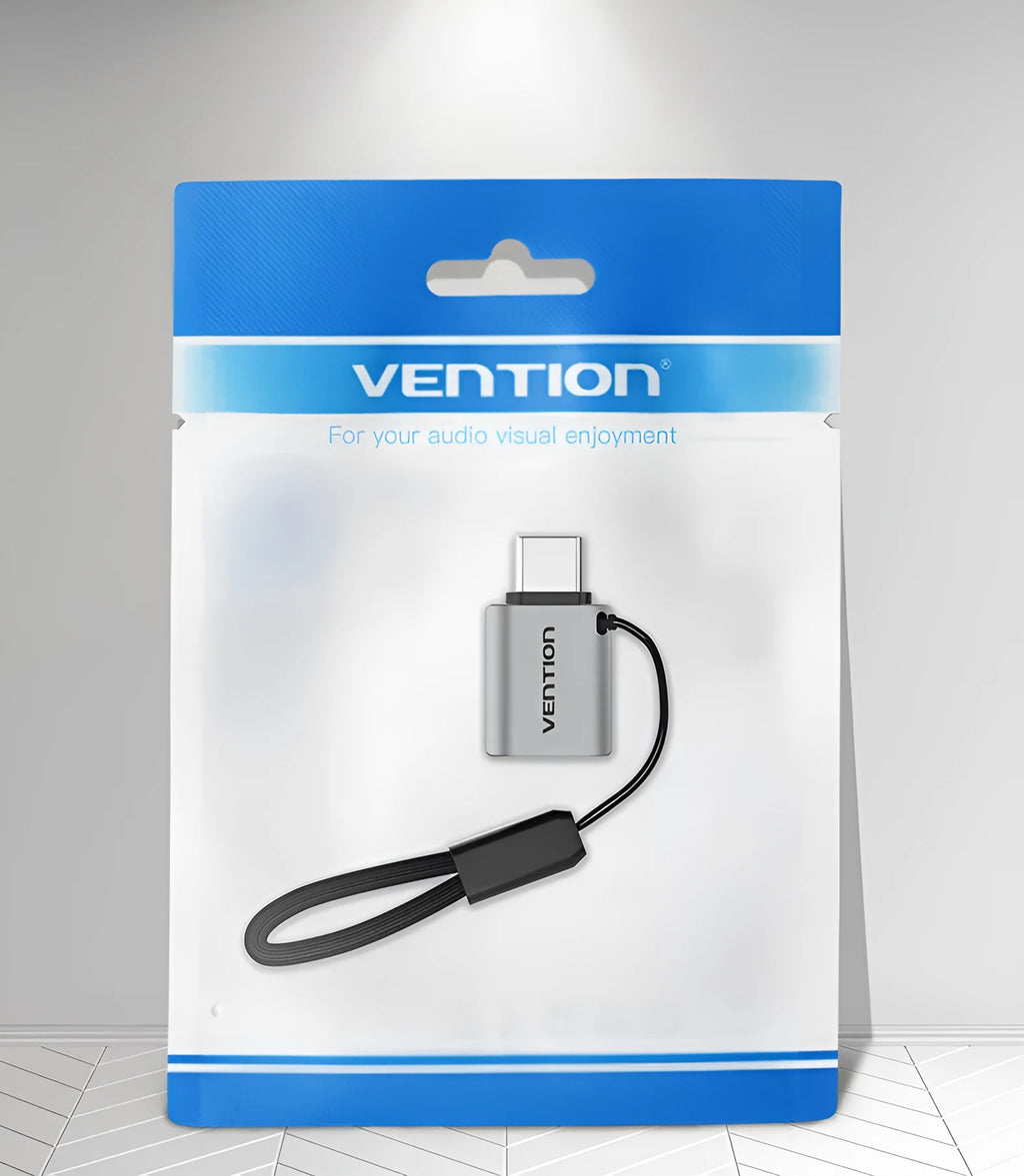 Grey aluminium alloy USB 3.0 Type-C Male to Type-A Female OTG adapter with attached lanyard.