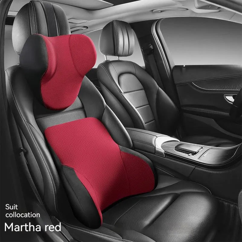Black memory foam car headrest and lumbar support pillow set on a car seat