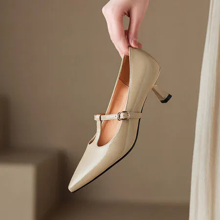 Black women's leather high-heeled shoes with a square toe and a 6-8 cm rubber sole.