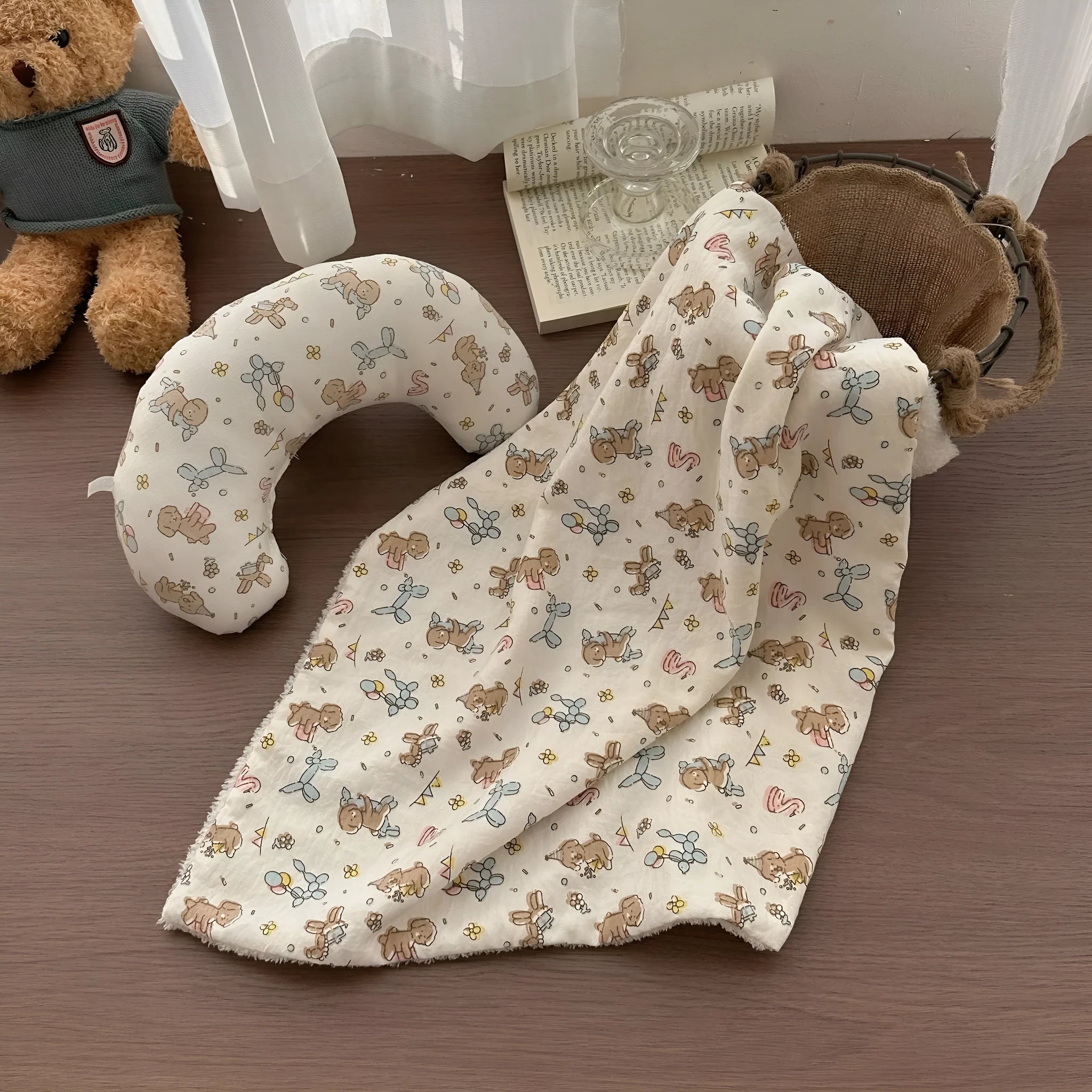 Cloth cat bed set showing pillow and two quilts in different sizes for feline sleeping