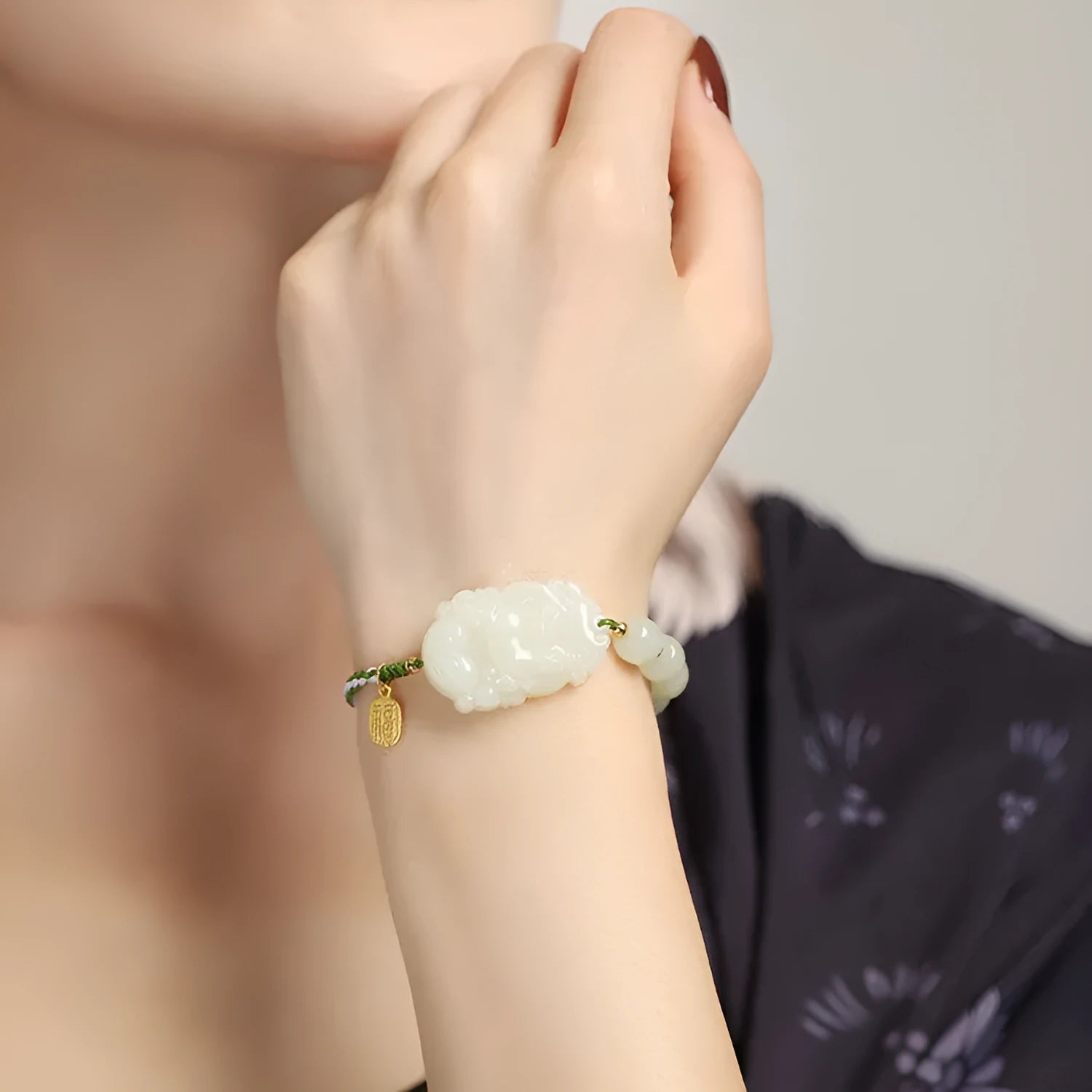 Hetian jade and S925 silver Chinese zodiac bracelet on a red rope for the Year of the Rabbit