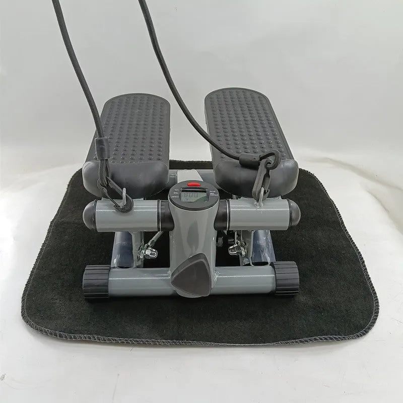Silver grey hydraulic resistance mini treadmill pedal exerciser for home waist slimming.