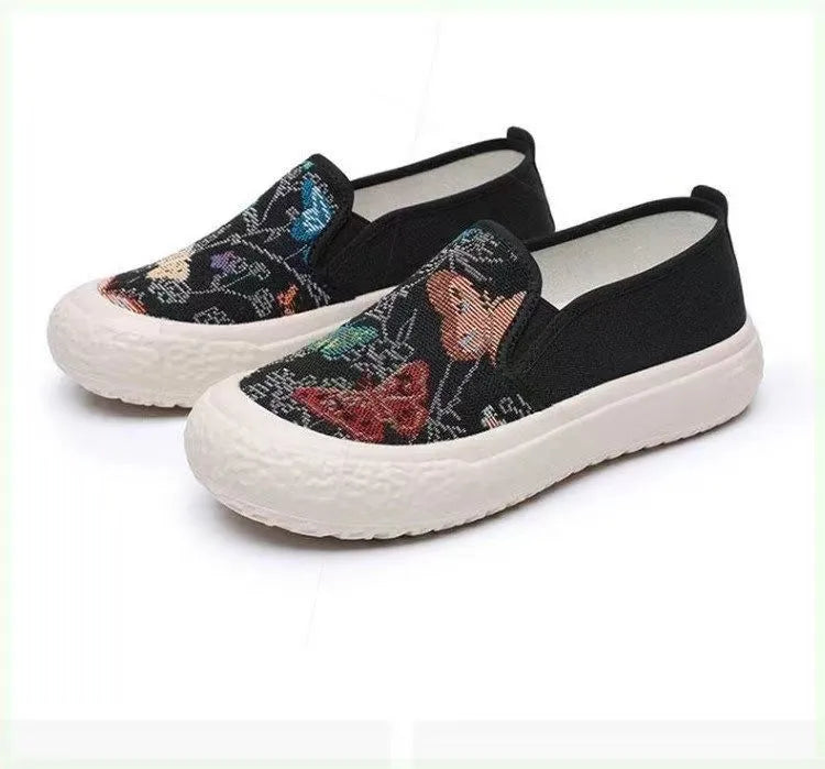 Old Beijing women's canvas slip-on shoes with plastic soles in black and white colours
