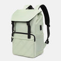Light green schoolgirl travel backpack showing laptop compartment and organisational pockets