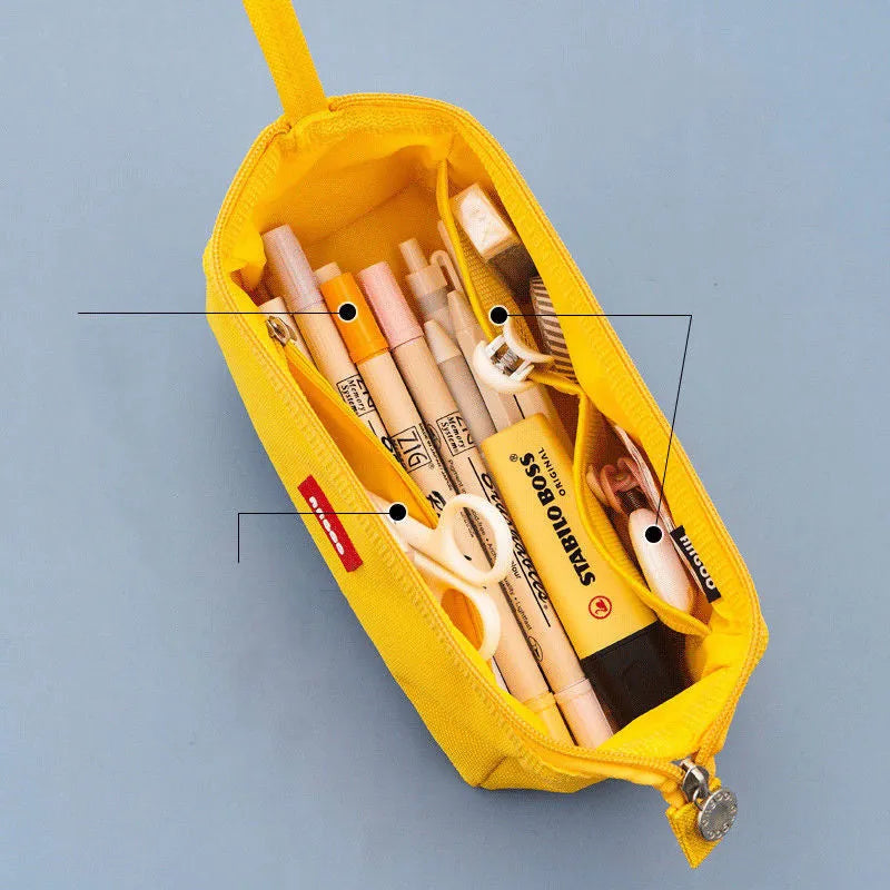 Large Oxford cloth pencil case with double zipper closure in dark blue, black, or yellow colour options.
