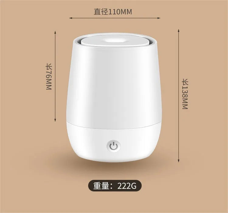 White USB aromatherapy diffuser with simulated flame effect showing mist output