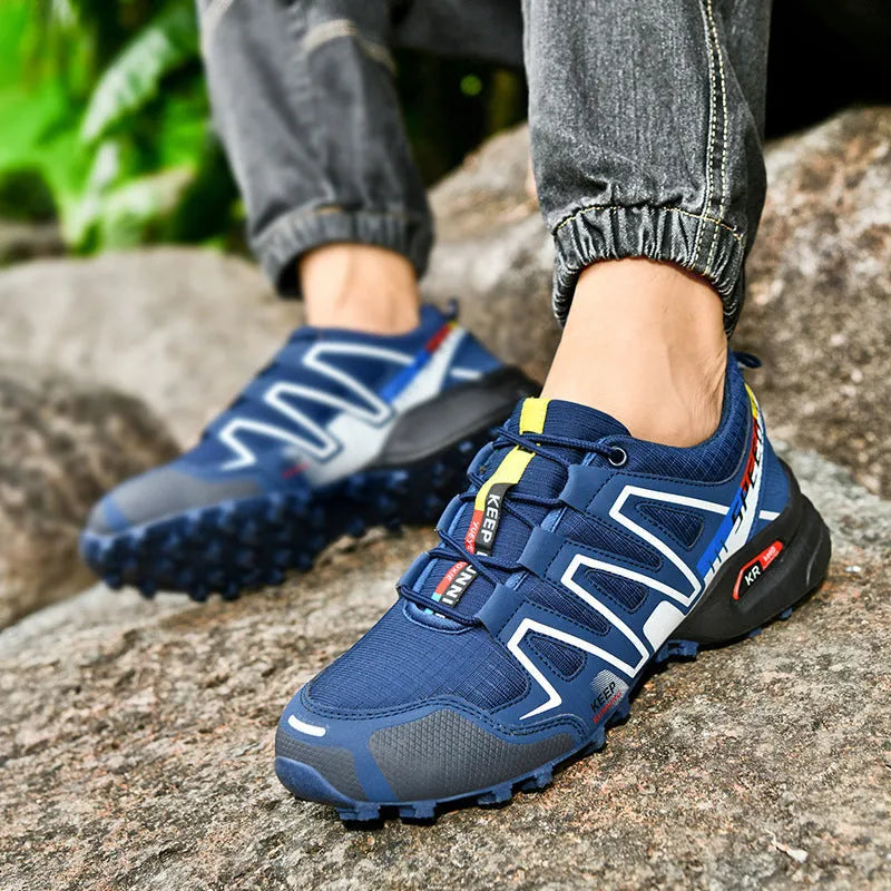 Men's grey orange synthetic leather casual shoes with mesh lining and a rubber sole.