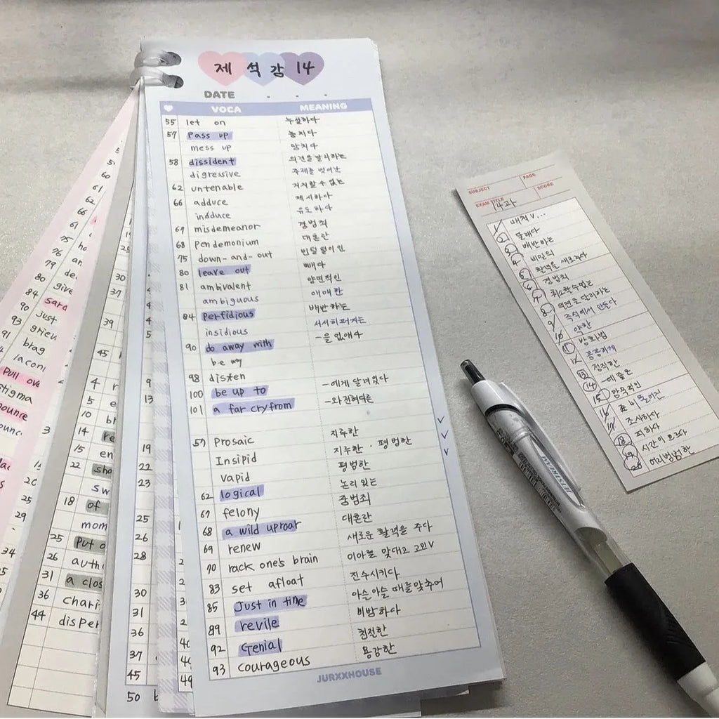 Vertical half-B5 notepad with English words, shown in pink, purple, and blue cover colour options.