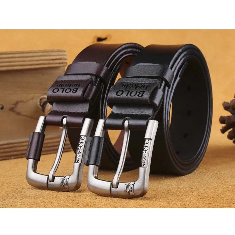 Men's cowhide leather belt with round alloy pin buckle, black colour, on a flat surface