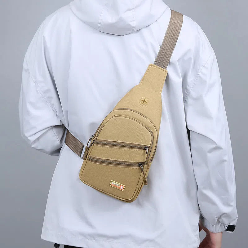 Lightweight waterproof canvas crossbody bag for men with stitching detail, one size, 7 colour options including khaki and black