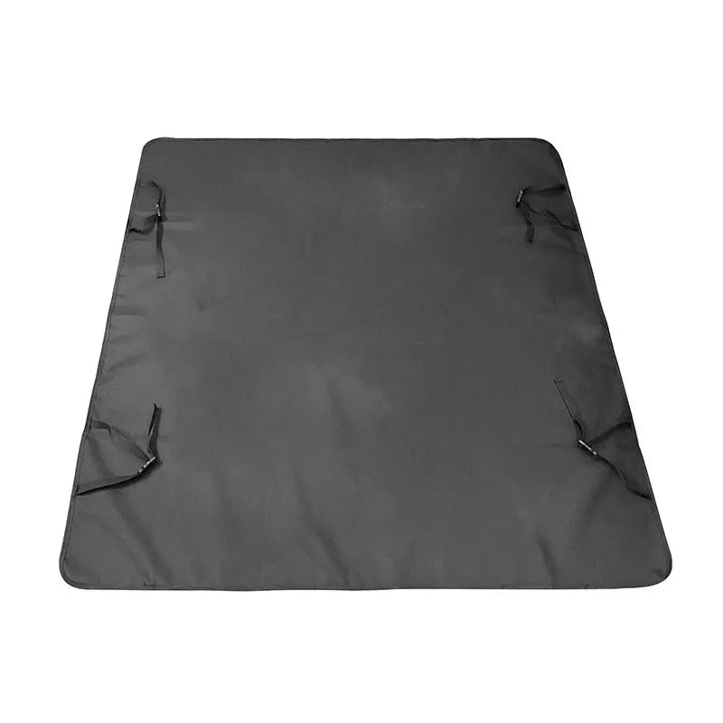 Grey car pet mat with dog bone print covering a vehicle's rear seat.