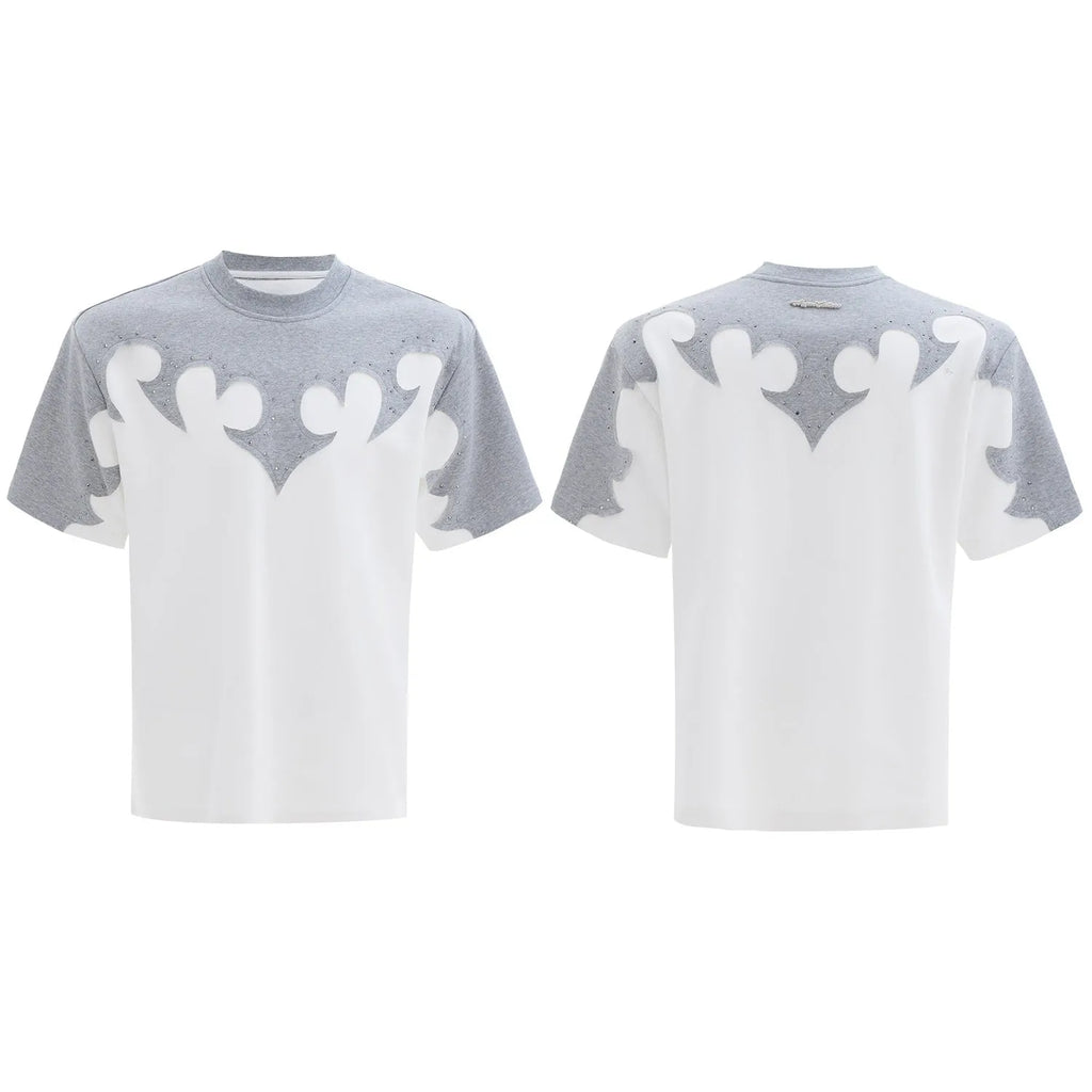 Grey men's loose-fit cotton T-shirt with textured 3D stitching and burnt flower detail on chest, short sleeves, round neck.