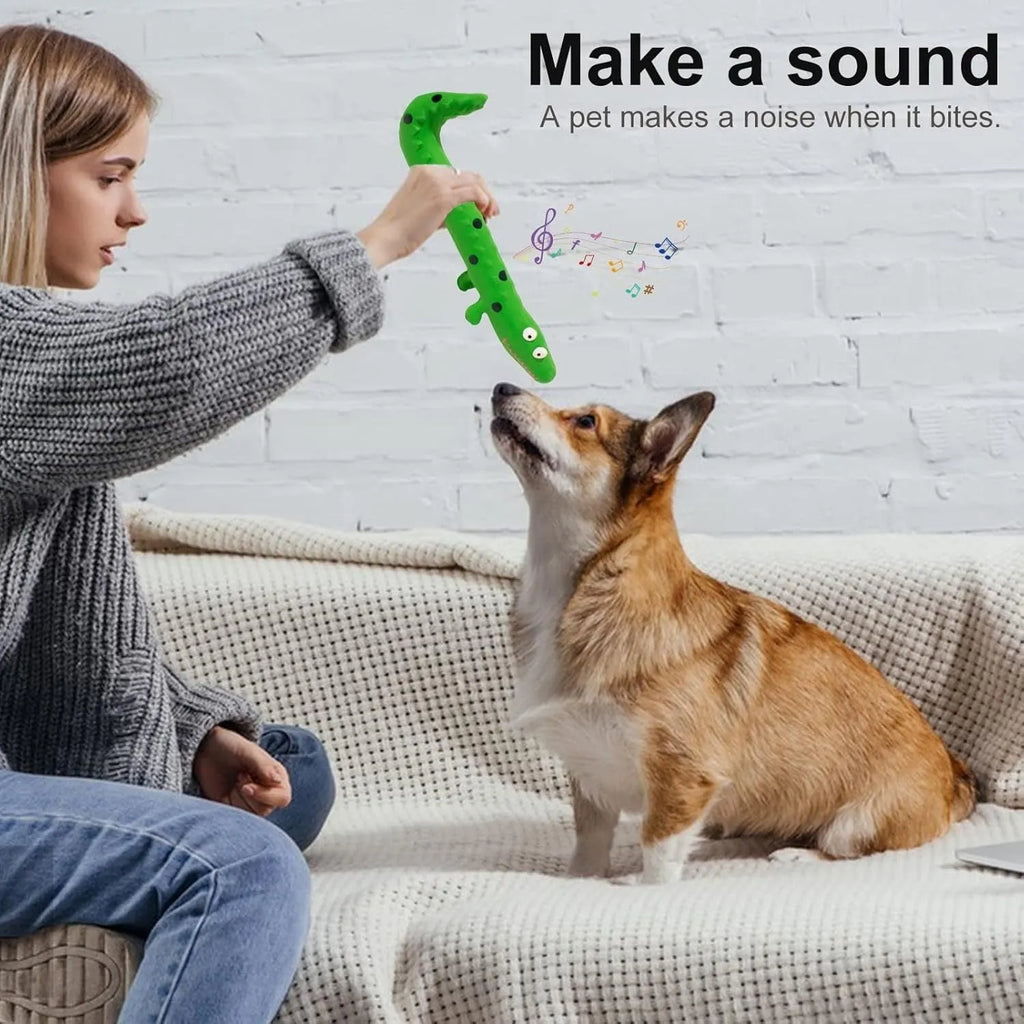 Green cartoon lizard-shaped dog chew toy with squeaker for aggressive chewers.
