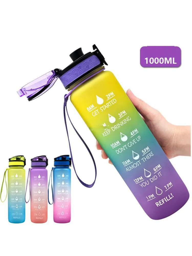 Transparent 1000ml plastic water bottle showing clear Tritan construction with visible liquid