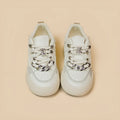 Casual white low-top lace-up sneakers for women with rubber sole and thick bottom heel