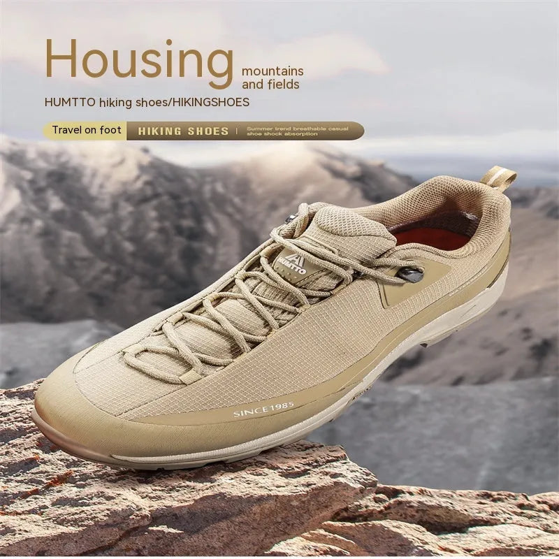 Men's low-top mountain climbing hiking boots in leather mesh with non-slip rubber sole
