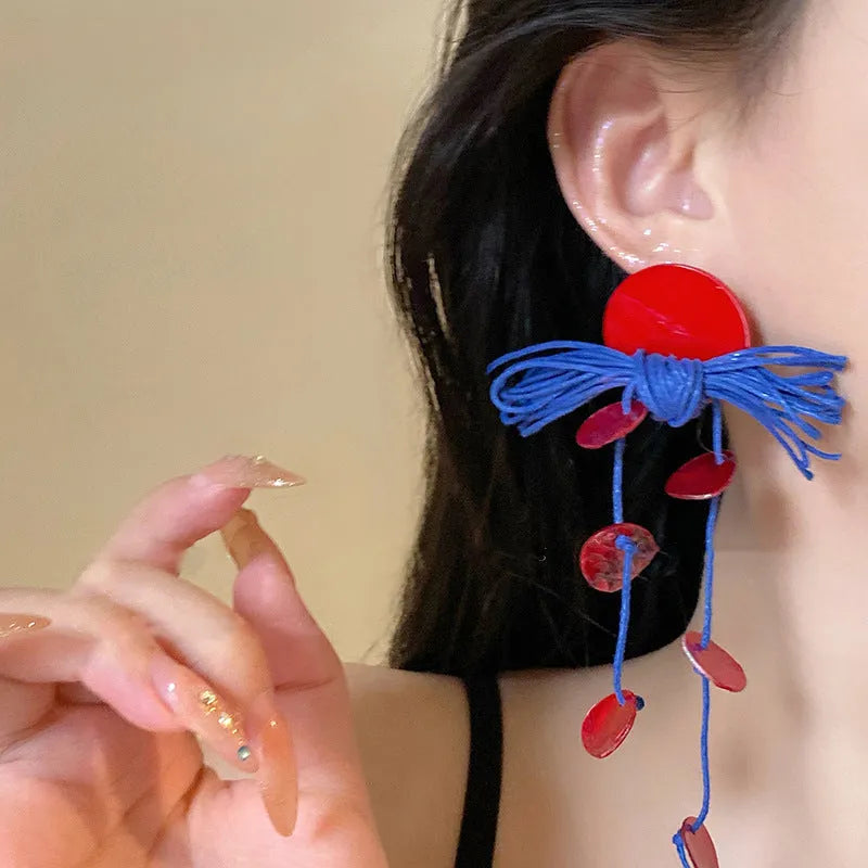 Geometric women's earrings with round elements and silver needle blue resin flower on cloth material