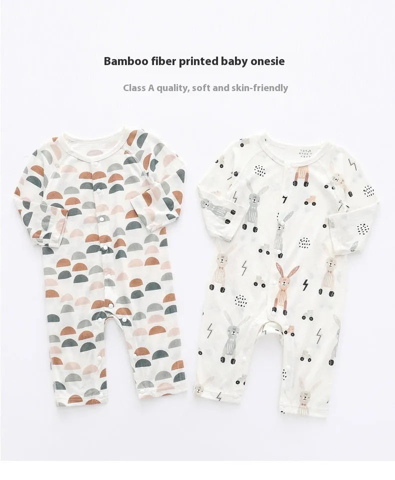 Baby wearing a soft bamboo fibre jumpsuit with a cute Nordic animal print, long sleeves.