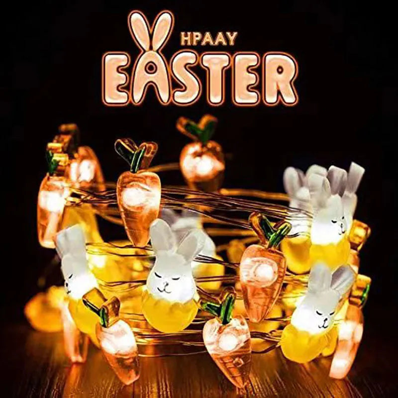 Easter carrot and rabbit shaped battery-operated LED decorative string lights on a dark background.