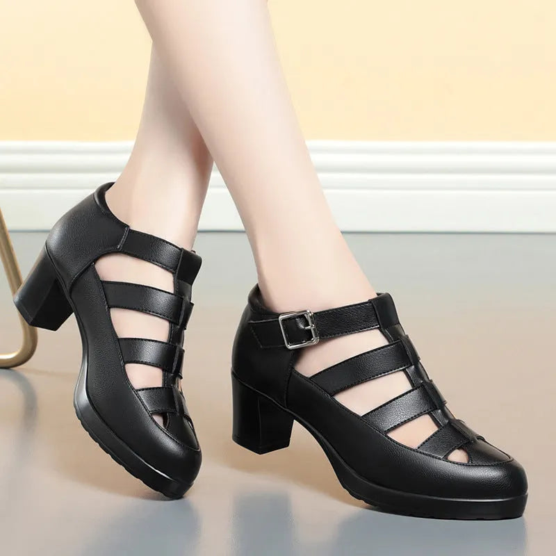 Women's closed toe sandal with chunky heel, woven upper, ankle strap, and back zipper.