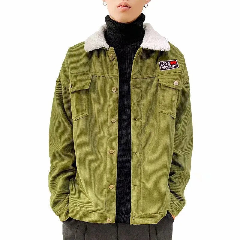 A man's loose-fit corduroy jacket in khaki colour with stick pockets, shown on a hanger.