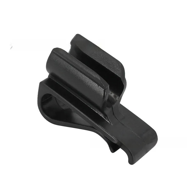 Black ABS plastic golf club clamp holding a golf club shaft