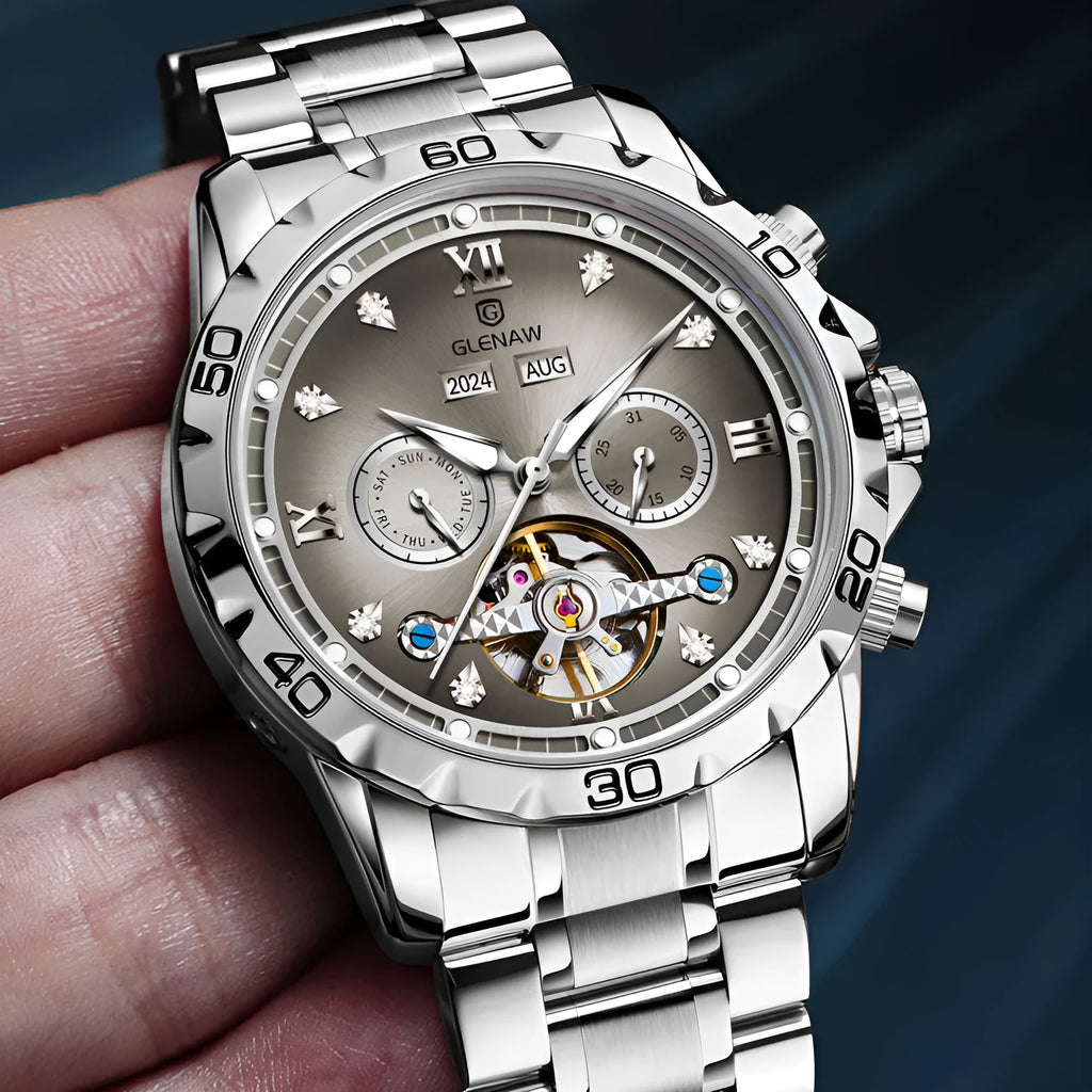 Men's automatic mechanical watch with stainless steel strap on a wrist, showing a grey dial and silver case option.