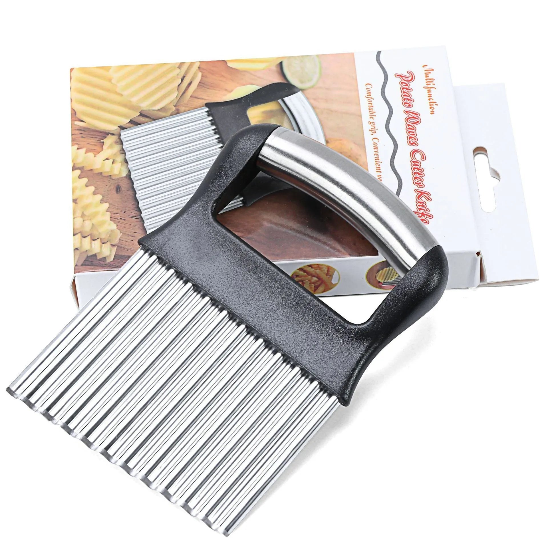 Stainless steel potato wave knife for making crinkle-cut chips on a wooden board