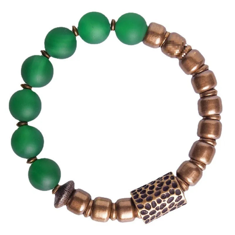 Retro ethnic style couples bracelet made of natural green and red agate beads on a string.