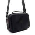 Black EVA hard shell game console storage bag with accessory compartments