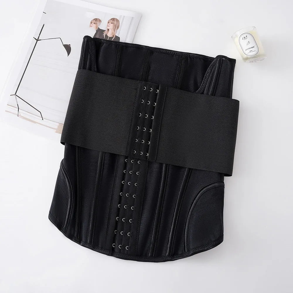 Nylon belly band waist trainer in black and apricot colours, shown laid flat.