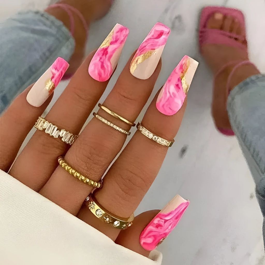 One Second Wearable Manicure set showing 24 blush-coloured false nails with rose, tulip, leopard print, and XINGX patterns and glue.