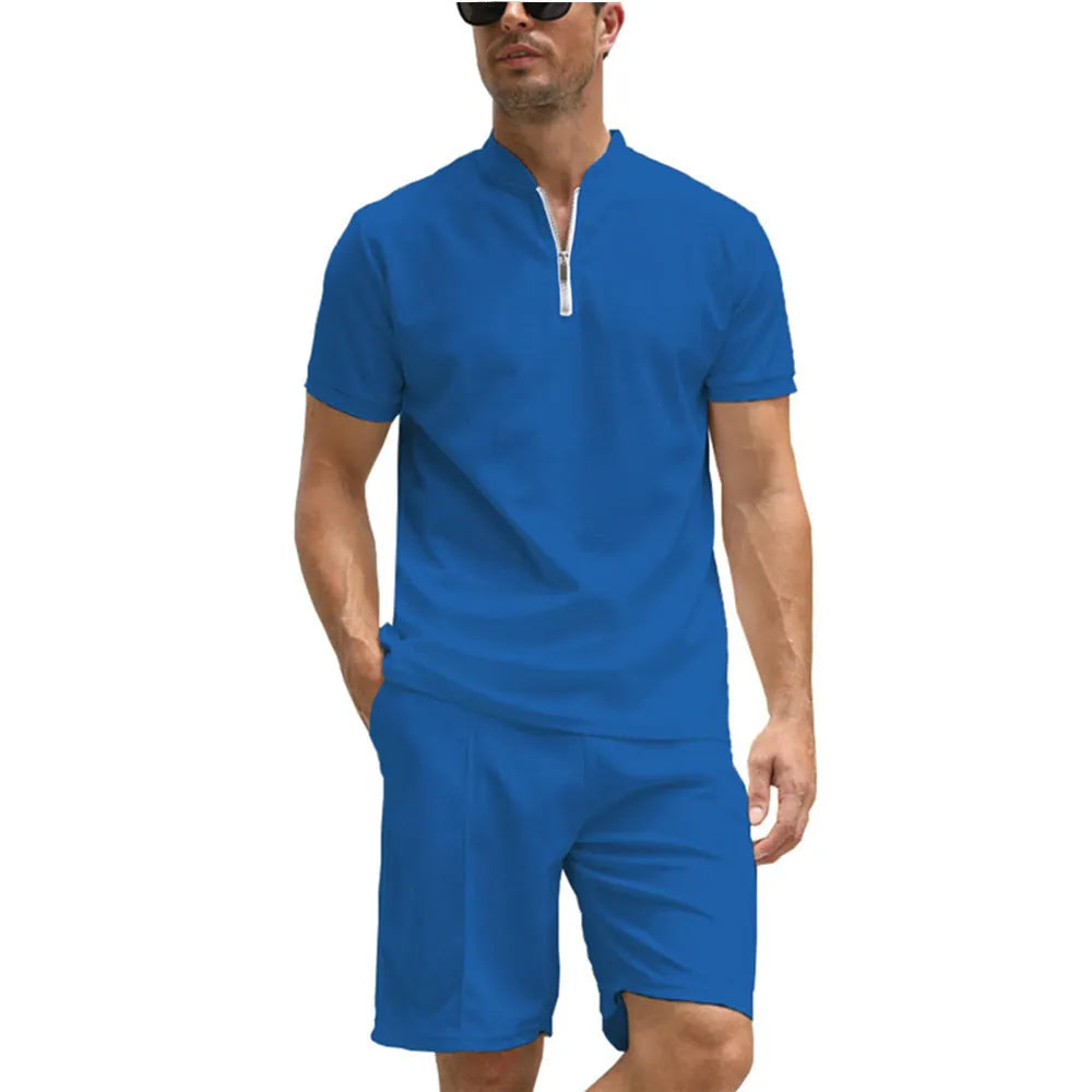 Men's solid colour polo shirt and trouser two-piece suit set in beaded bird's eye polyester fabric.