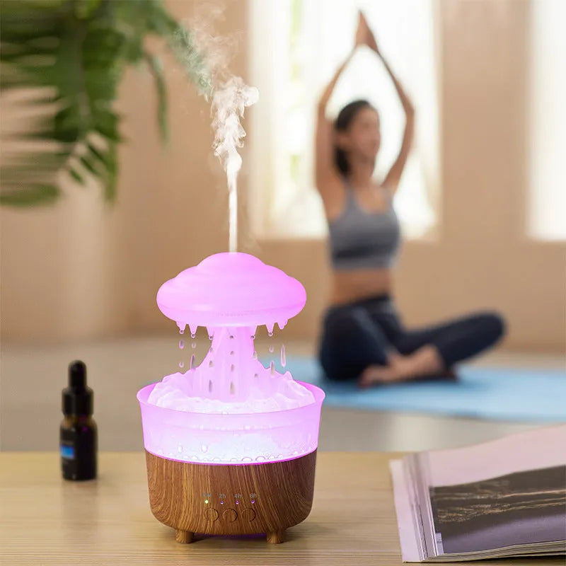Wood grain rain cloud shaped ultrasonic humidifier and essential oil diffuser with coloured LED lights.