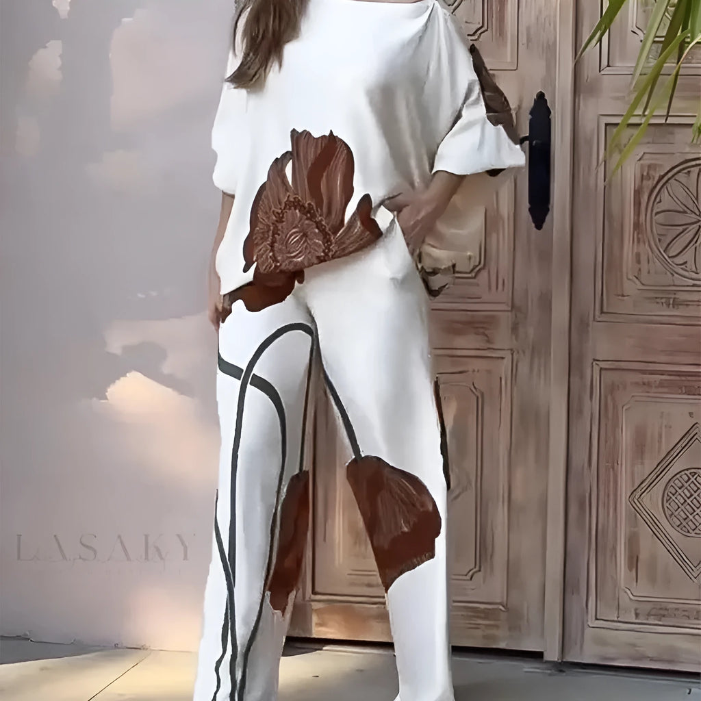 White printed top and straight-leg pants casual fashion set on model