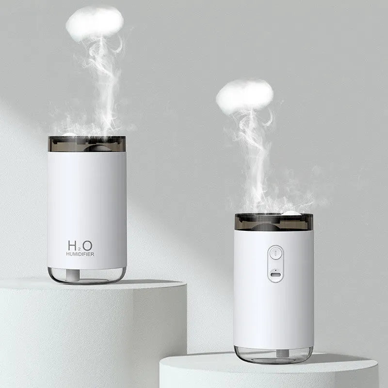 Jellyfish-shaped USB humidifier with smoke ring mist output and warm night light in blue colour
